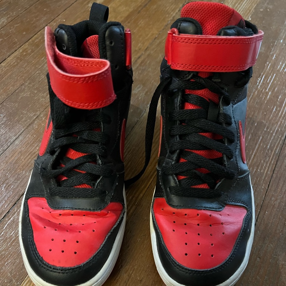 Red and black Nike Mids Youth size 6. Still in great condition